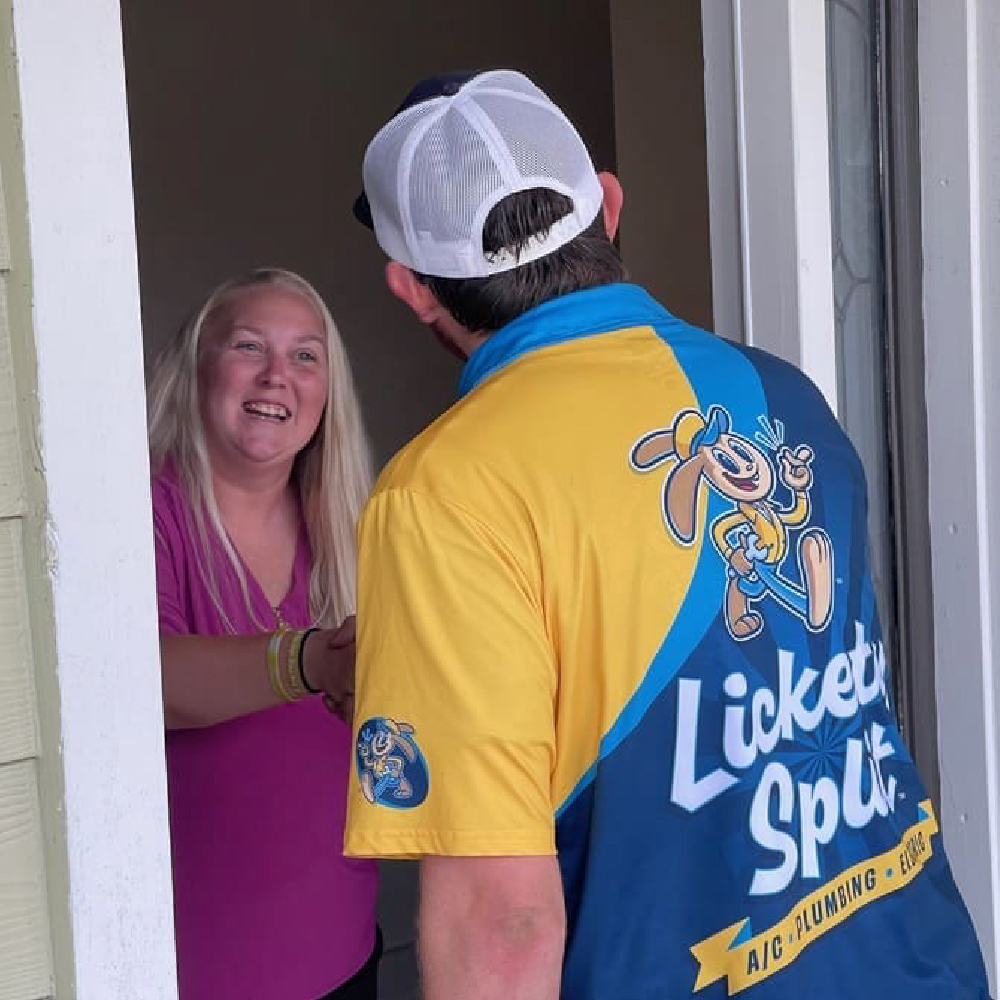 Lickety Split technician greeting a Northeast Florida homeowner